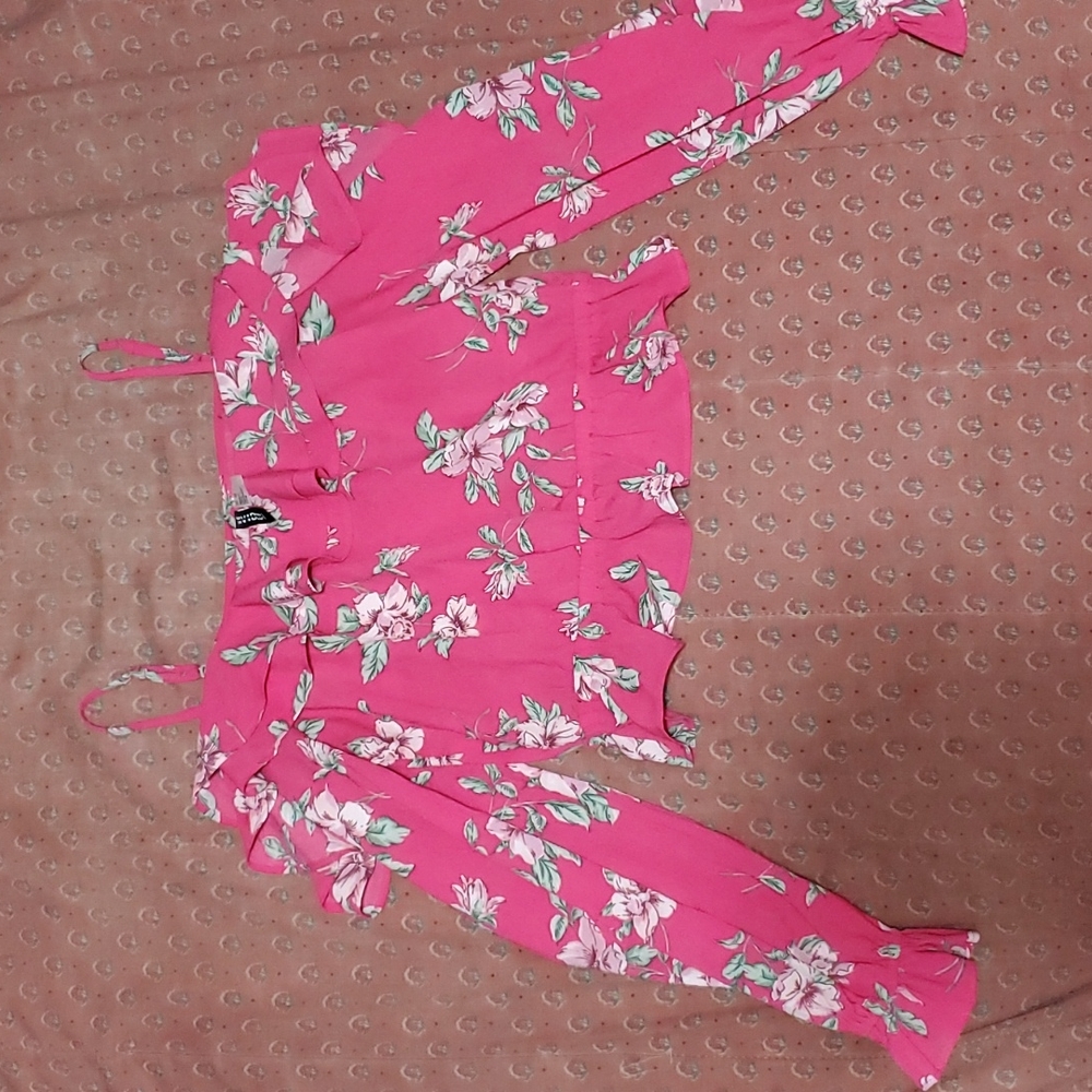 An off the shoulder ruffle flower top